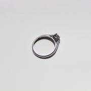 Solitario de diamante. Montura catedral - 4 uñas.