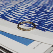 Argolla media caña con diamantes