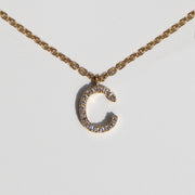 Collar C con diamantes